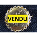 Gold metal pin encrypted FK 