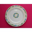 Assiette en porcelaine de Limoges estampillée Tharaud