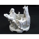 Father bisque stage and her child in the cradle