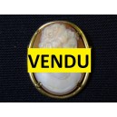 Old brooch decorated with a cameo shell