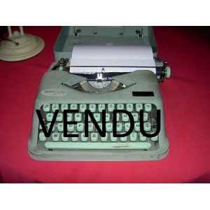 Machine à écrire Hermès Baby avec malette de transport
