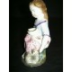 figurine fillette au chat en biscuit