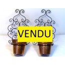 Pair of wrought-iron wall-mounted pot holders and Goard&egrave;re copper cork-pots
