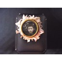 Old art nouveau brooch with photo holder in silver metal
