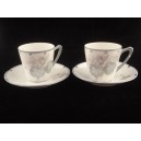 Pair of antique porcelain cups with cyclamen decoration