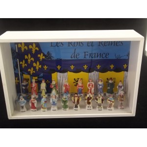 Collection of French Kings-themed fèves in its display case