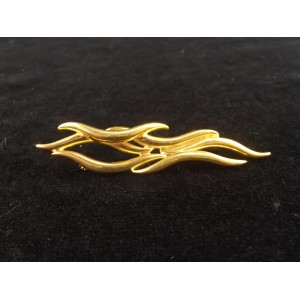 Broche vintage plaqu&eacute; or sign&eacute;e Balmain