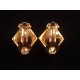 Paire de boucles d'oreilles clips en métal doré couture marque D'Orlan