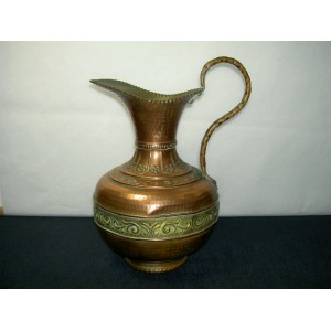 Hammered copper vase and pushed