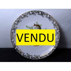Porcelain plate decorated with fish
