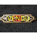 Old gilt brooch adorned with a tourmaline