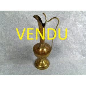 Metal ewer carved oriental style