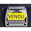 Typewriter hermes baby with its carrying case